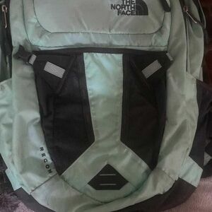 The North Face Mint and Black Backpack